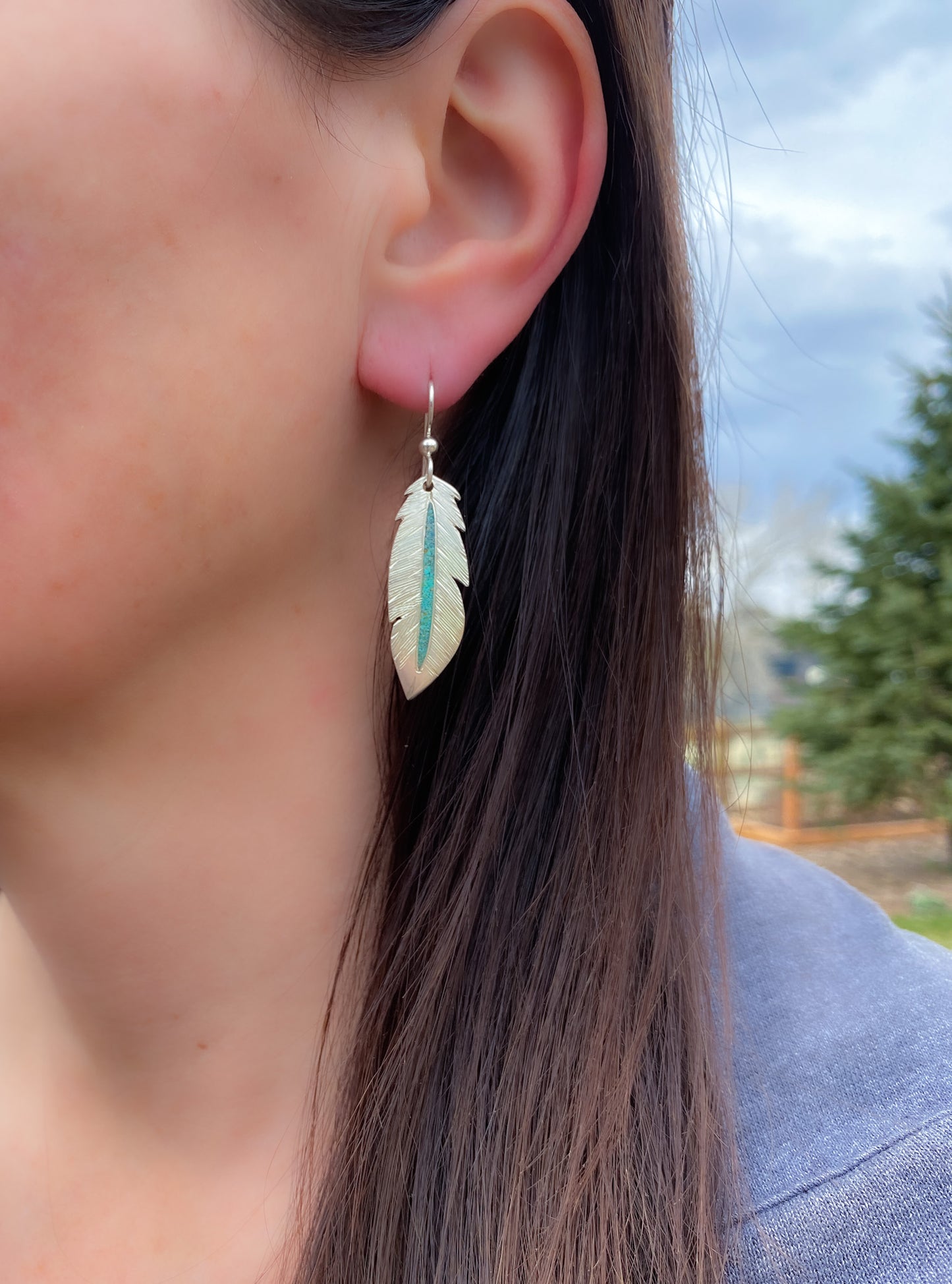 Sterling silver feather earrings with crushed turquoise