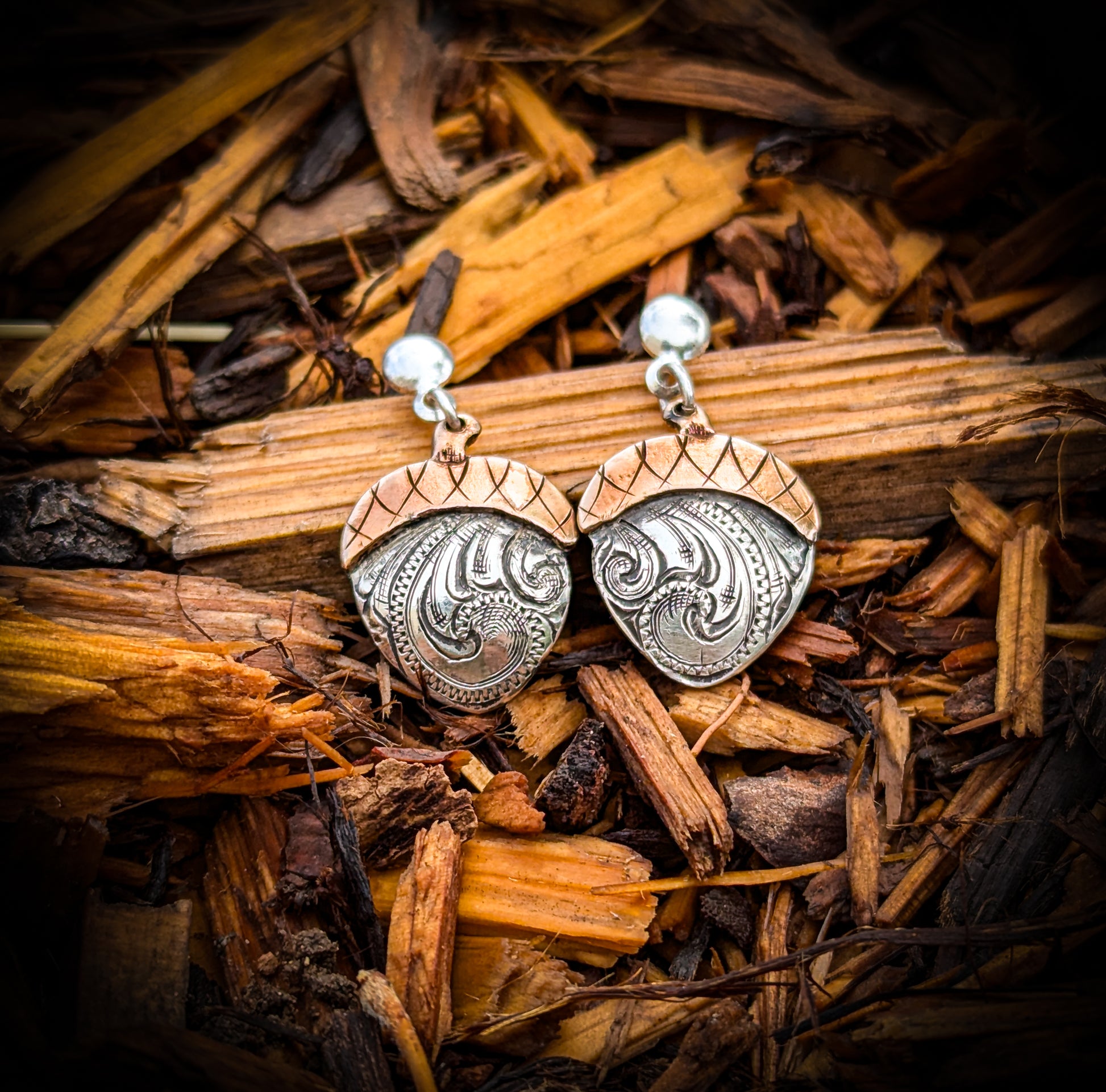 Western style Engraved Silver and Copper  Acorn Earrings for Sale.