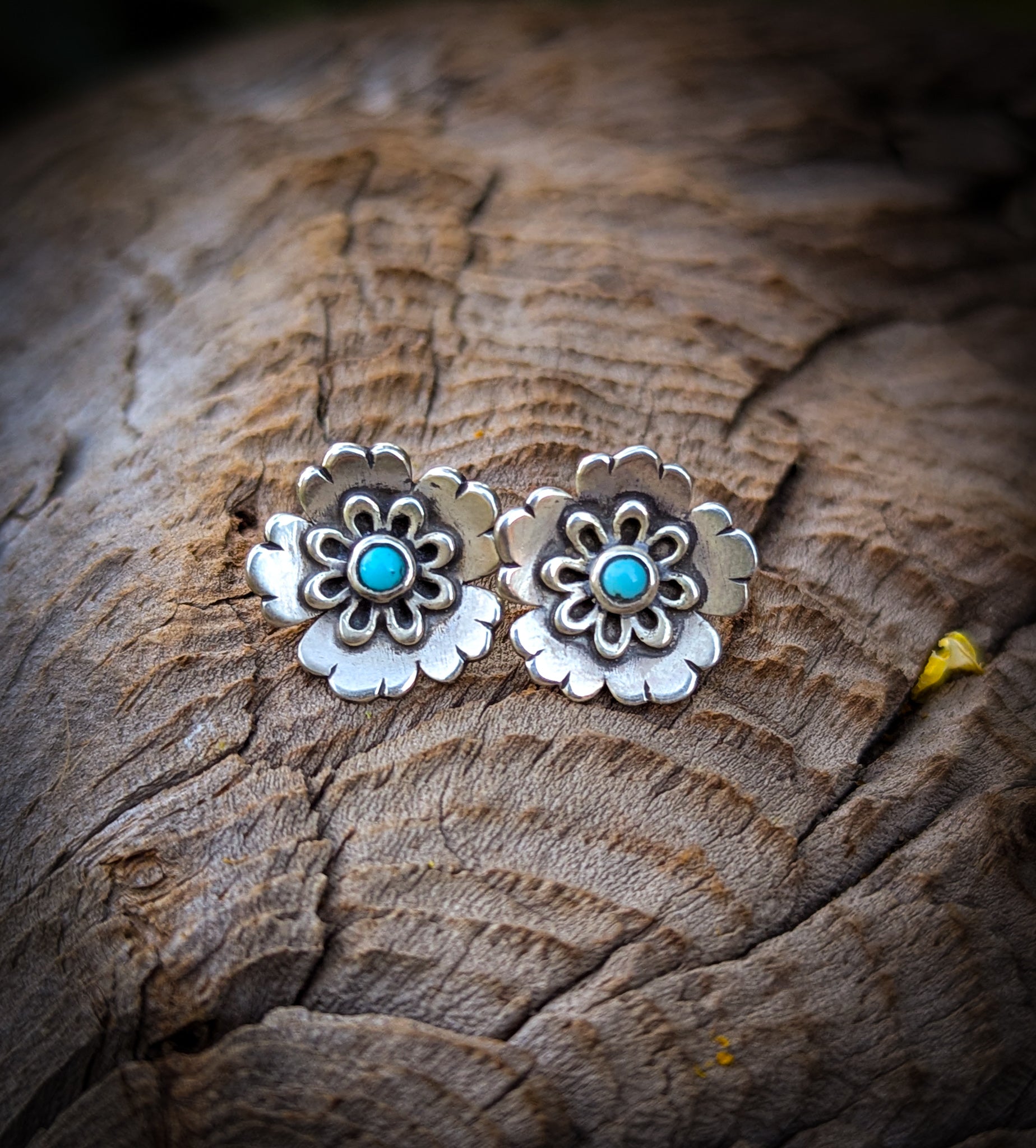 silver flower stud earrings with turquoise centers