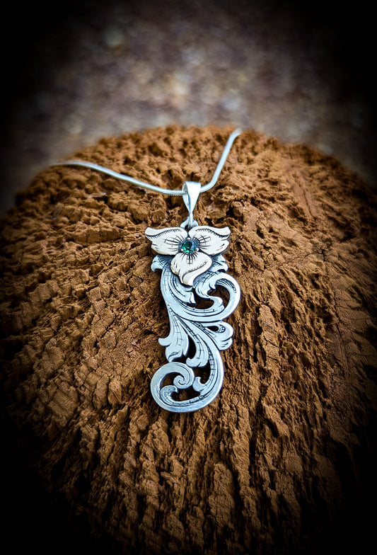 Sterling Silver and Jewelers Bronze Flower Scroll Necklace with simulated emerald center stone