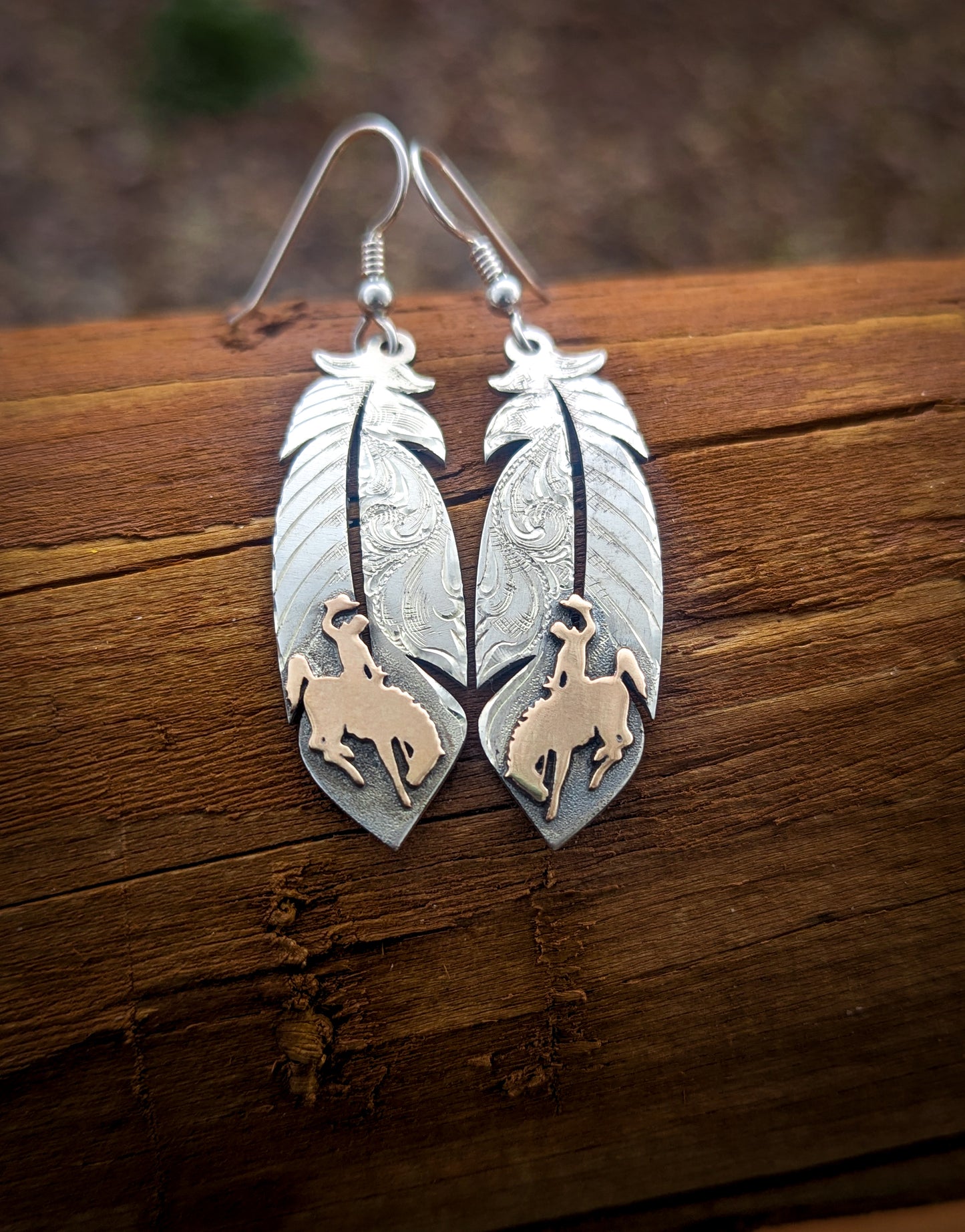 Feather Earrings – Wyoming Bucking Horse & Rider
