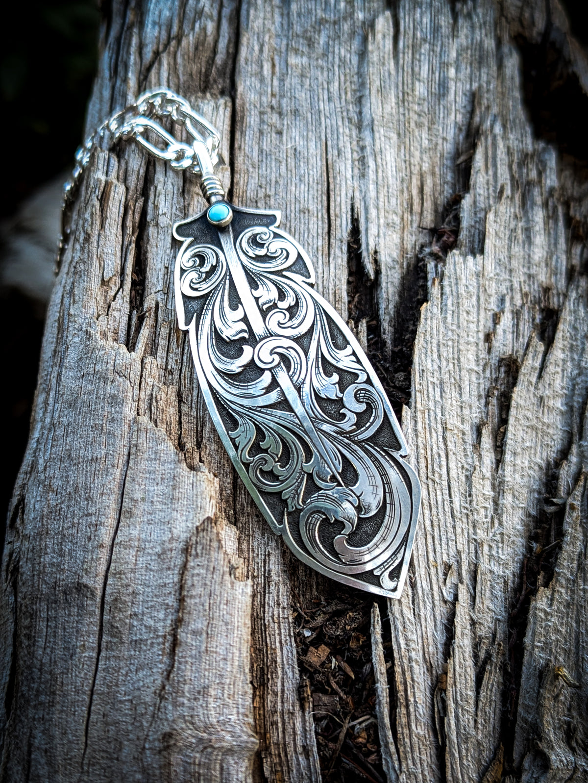 Hand-Engraved Sterling Silver Feather Pendant with Kingman Turquoise