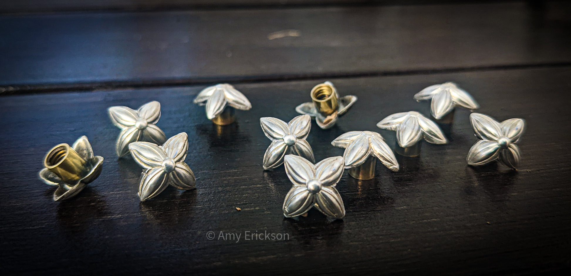 Sterling silver 4 petal small square flower conchos  with chicago screw backs.